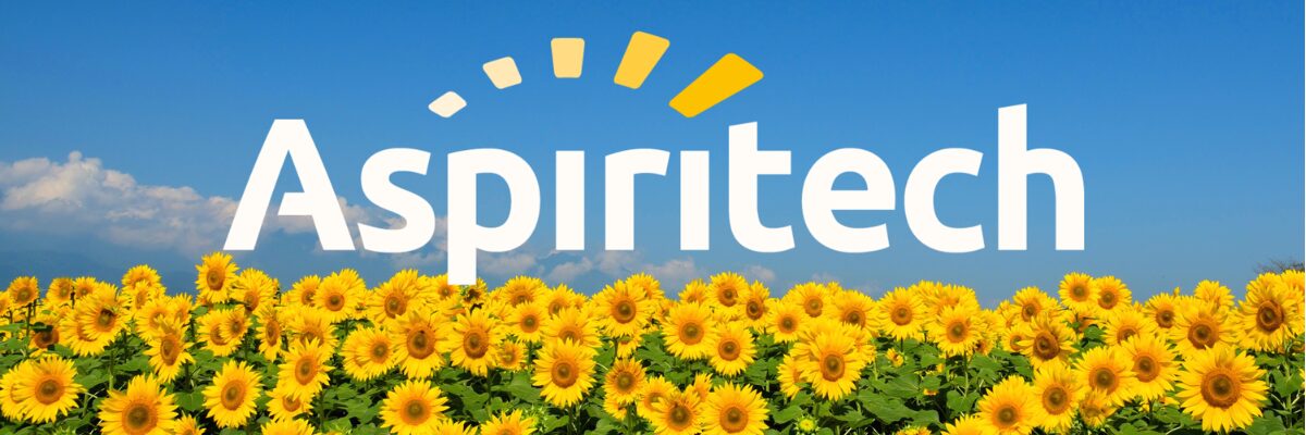 The Aspiritech logo above a field of sunflowers.