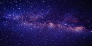 A purple galaxy viewed from space.